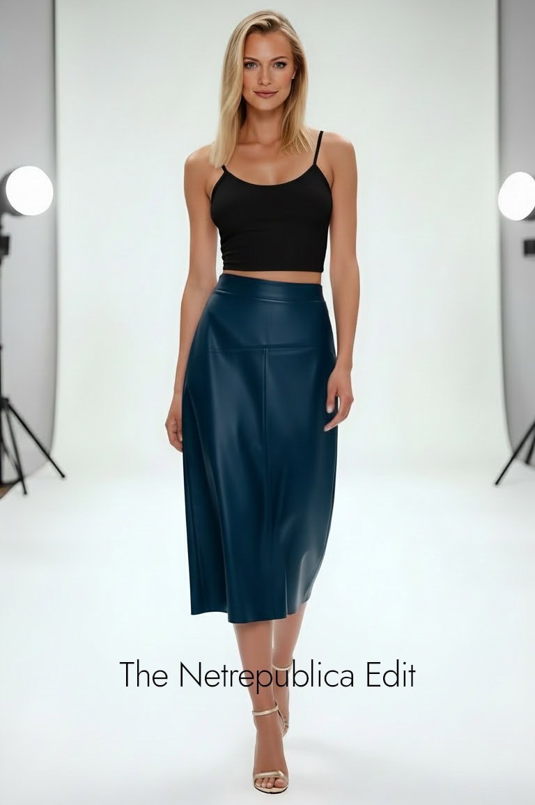 Jild-Real-Lambskin-Leather-Skirt Model wearing a long leather skirt in a studio, she is modeling the Jild Real Lambskin Leather Skirt in blue