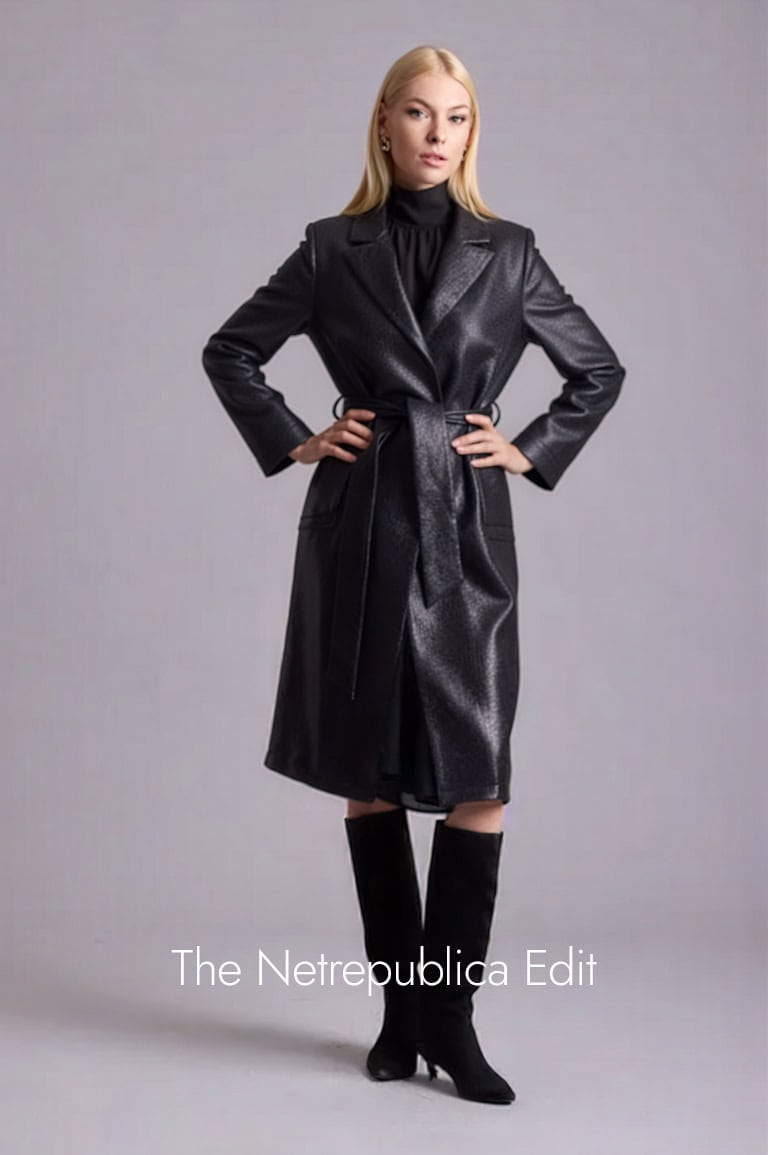 model in a studio wearing a jamie trench coat