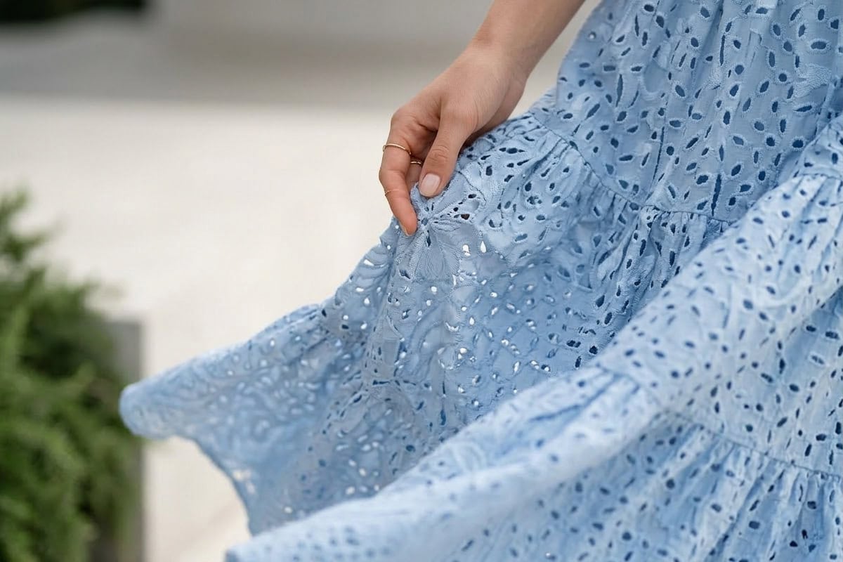 flowy-maxi-dress-fabric close-up of flowy maxi dress fabric showing texture and movement in soft natural light